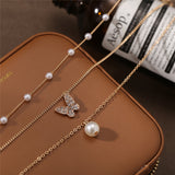 17KM Trendy Multilayered Butterfly Pearl Necklace For Women Fashion Sun Star Gold Pearl Choker Necklaces 2021 Trend Jewelry Gift